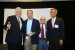 Professor T. Grandon Gill, Chair of the Award Ceremony, Professor Hsing-Wei Chu, Program Committee Co-Chair, and Dr. Nagib Callaos, General Chair, giving Dr. Robert Cherinka a plague "In Appreciation for A Great Keynote Address at a Plenary Session."